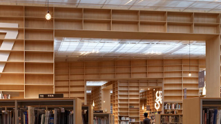 Illustration for article titled A Towering Temple of Bookshelves for Books and Readers